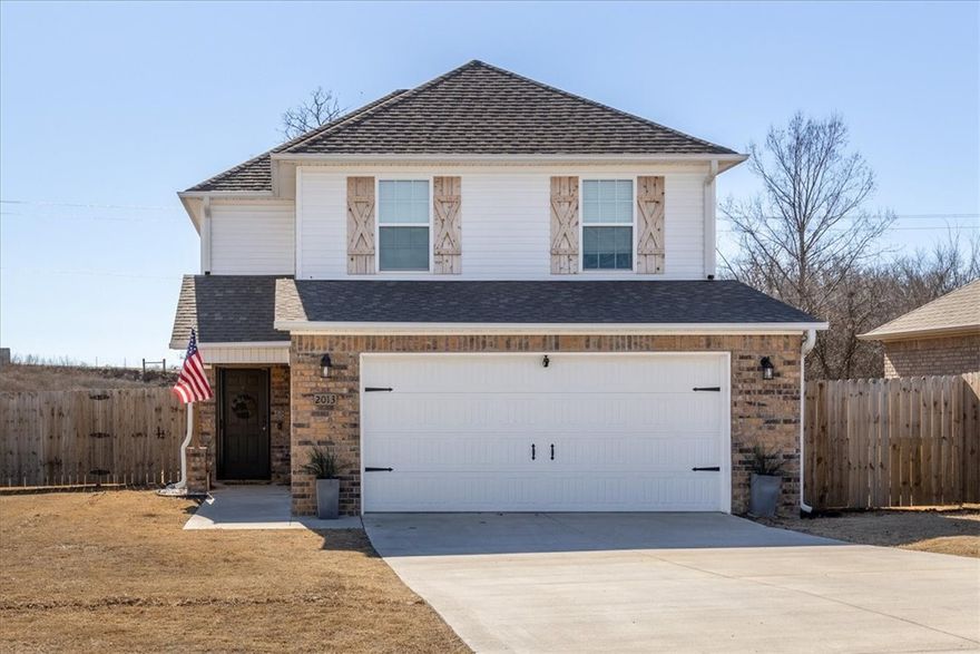 This beautiful home has several standout features! Two stories with custom wood shutters adding warmth and curb appeal. Like new interior with no carpet, double pantry, and great closet spaces. Oversized main suite. The main bath has jetted tub/shower combo with full tile and double vanity. Garage space with built-in storage/workbench. Yard has been on contract and treated for weeds and crab grass! Private backyard that backs up to an undevelopable parcel owned by the subdivision.