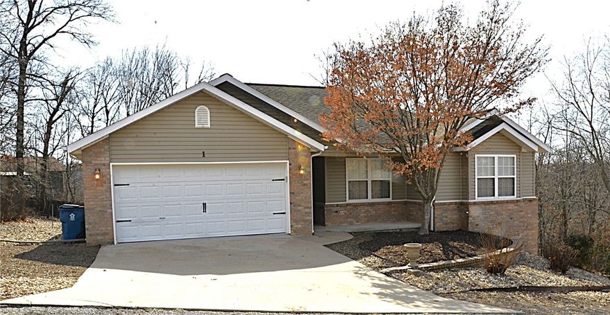 Welcome to 1 Martham Ln. Located in the heart of NW Arkansas's playground with easy access to Landline MB Trail just around the corner and London Boat Ramp accessing Lake Windsor just minutes away. This move-in ready home features fresh interior paint, newer Stainless appliance package to include the Refrigerator along with a water cooler for refreshing hydration after a day on the trails or the lake. With pet friendly wood-look tile throughout the living areas, there is no worries that your furry friends will scratch or damage your floors. High ceilings with crown molding accent the LR where the gas-log fireplace will delight and relax you on those cold winter evenings. The climate controlled bonus room in the lower level is perfect for your bikes, kayaks or to use for a work shop. The low maintenance yard ensures extra time to enjoy all that NW Arkansas has to offer. So whether you are looking for your first home or your retirement home, don't miss your opportunity for this slice of NW Arkansas's playground.