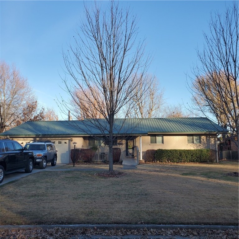 Fantastic location! Welcome home to bright & open living areas! Beautiful spacious home. Updated kitchen, bathroom, and laundry room. Metal roof 9 yrs old, AC 9 yrs old, Giant open kitchen & dining, gorgeous back deck, incredible sun room and space for the whole family. Refrigerator/washer/dryer/hot tub negotiable. Please use mask & gloves provided! Agent owned.