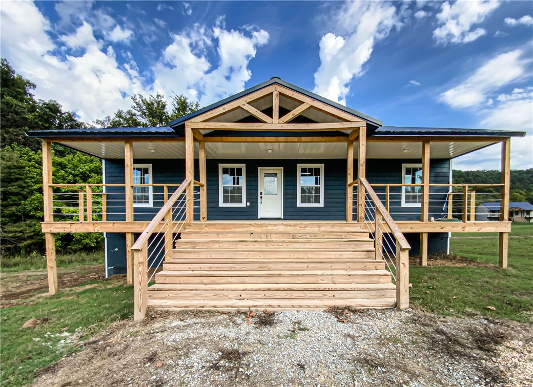 2024 Custom Build with Norfork River Views in the Ozark Mountains! Discover your dream home nestled in the heart of the Ozarks. This brand-new 2024 custom build offers 3 bedrooms, 2 bathrooms, and peaceful Norfork River views. The open floor plan showcases a modern kitchen with quartz countertops and brand-new appliances, perfect for both everyday living and entertaining. The master suite provides a private retreat, while the main level boasts 1,466 square feet of living space, with a total of 2,909 sq. ft. The lower level features a spacious two-car garage with ample storage, and you're just minutes away from the beauty of the Ozark National Forest and the charm of downtown Norfork. Whether youāre seeking nature, comfort, or convenience, this home has it all. 46x32 metal building w/power, separately metered. Don't miss outāschedule your showing today!