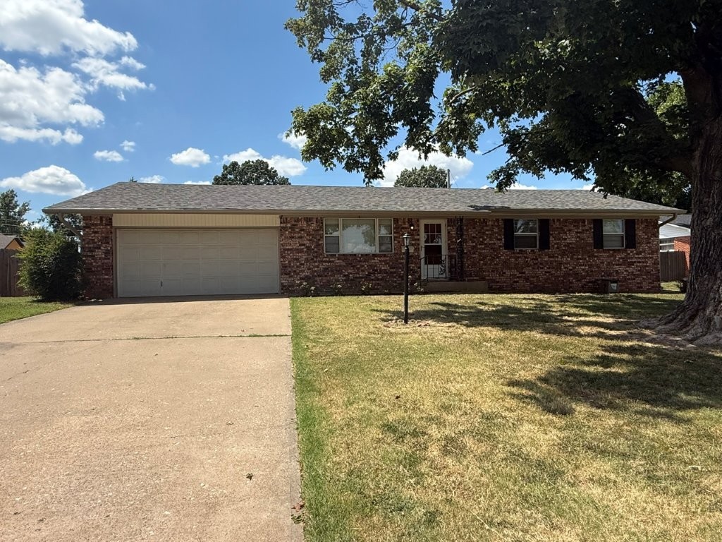 Centrally located near Rogers downtown area, this all brick home features a nice living area that leads into the dining and kitchen with sliding glass doors out to the patio. Walking distance to the ballpark or play tennis close by. New roof, gutters, shutters were installed in 2024. HVAC approximately 10 years old. This would make a great first time home purchase or investment property!
