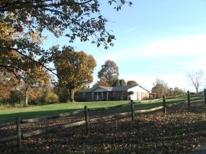 Neat 3 bedroom 2 bath home on 76 acres with a pretty mix of pasture and trees. Home features pretty sunroom large master bedroom, and gas log fireplace. Acreage is mostly open in permanent pasture with several ponds and seasonal creek. Some wooded areas and large scattered trees. Views. Nice location on paved street approx. 18 minutes from Harrison. This one deserves your attention. All #'s are approx.