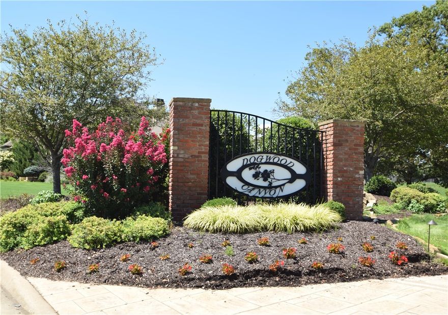 Absolutely Gorgeous, Estates at Dogwood Canyon! One of NWA's most beautiful neighborhoods. Your dream home awaits on this 1.60 acre, wooded private lot. Easy drive to I49 and close to shopping, schools, the U of A, and health care facilities but in quiet, peaceful subdivision.  This to be built home has an open floor plan and will have a formal dining room, the kitchen will have huge walk-in pantry.  Home will have 4 bedrooms, 3 baths all on the main level. Master suite has large walk-in closet and exercise room or office off of the master bath.  Large covered patio just off breakfast and family room.  Upstairs will have a media room, large billiards area and a game room.  Get this under contact early and you can help pick colors!