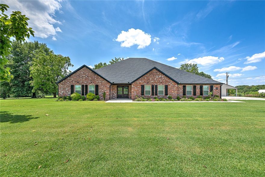 West Springdale/Tontitown – Fully Renovated & Loaded with Upgrades If you're looking for a home that has it all—inside and out—this stunning property is a must-see. Essentially a brand-new build,the original structure was completely stripped down & expanded delivering a home that blends modern luxury w/functionality. Sitting on a fully fenced 1.97-acre lot, the property is accessed through an electronic entry gate for added privacy & security.Outdoors,you'll find a spacious 30x40 shop with a carport overhang,& a wood stove-round.Step inside to find top-tier finishes, including wood flooring, ceramic tile, quartz and granite countertops,&LED lighting.Custom built-ins,detailed trim work,&two fireplaces bring warmth & charm to the living spaces.The heart of the home is the chef-style kitchen,w/a large walk-in pantry&open views into the living&dining .The primary suite is a true showstopper. It boasts a spacious bedroom, a luxurious master bathroom, and an enormous walk-in closet that will make organizing a breeze.
