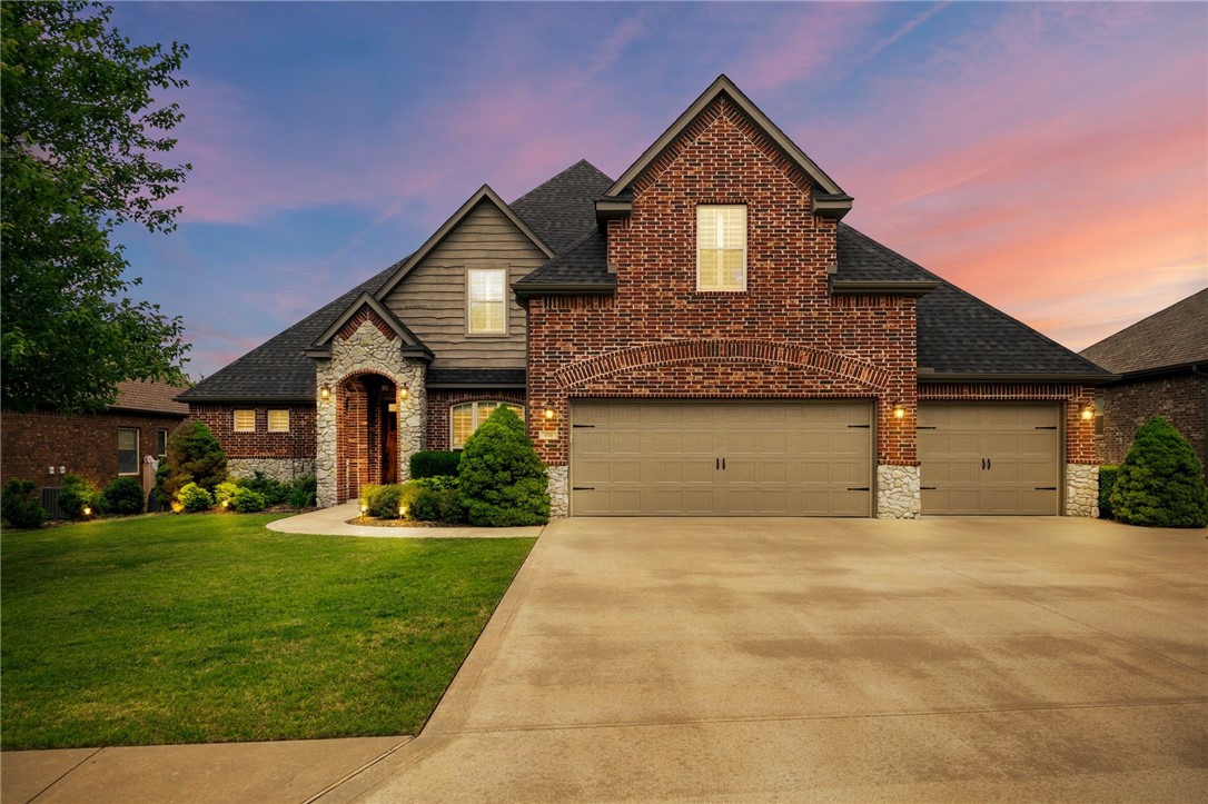 Exceptional location near Walmart’s new corporate campus! This beautifully maintained 4-bedroom home sits on a rare .37-acre lot in the highly desirable Woods Creek neighborhood. Situated directly across from the private neighborhood pool, playground, and park, with a back gate offering convenient access to it all, this home offers outstanding walkability. Inside, you’ll find custom cabinetry, solid hardwood floors, plantation shutters, and quality built-ins. The open floor plan features 3 bedrooms on the main level, plus a 4th bedroom and bonus/flex space upstairs, along with a built-in workstation ideal for students or remote work. Additional highlights include a mudroom off the spacious three-car garage and a large fenced backyard with both a covered patio and raised deck—perfect for relaxing or entertaining. Enjoy nearby access to trails and just minutes to downtown Bentonville. This home combines space, style, and an unbeatable location.