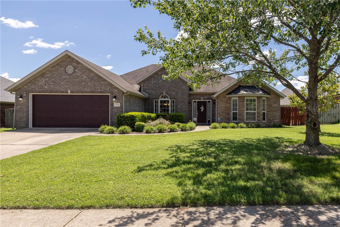 Conveniently nestled near vibrant downtown Springdale, this property offers easy access to all the city's attractions. Situated just moments away from Elementary and Junior High Schools, and located off Don Tyson Parkway, residents can effortlessly explore the scenic Razorback Greenway and swiftly reach Lake Fayetteville or The Jones Center. This charming four-bedroom, two-bath home boasts spacious walk-in closets and features ceramic tiling throughout the main living areas. The cozy bedrooms are carpeted for comfort, while the formal dining area with beautiful plantation shutters, adds a touch of sophistication. Warmth emanates from the gas fireplace in the welcoming living room, creating a perfect atmosphere for relaxation. Embrace the essence of convenient, comfortable living at its finest.