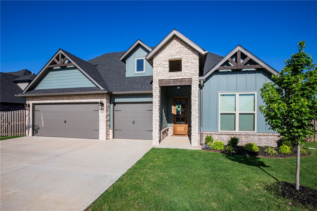 Welcome to the most impeccable home in Pea Ridge. This dazzler checks every box! 4 bedrooms with a great layout, 2 down and 2 up with 3 full bathrooms, and 3 car garage. Ultra clean, bright, soaring ceiling height and has the best curb appeal in the entire development. The laundry room and primary closet are the perfect size. The cabinet space in the laundry room is unmatched. The large living room is versatile to fit numerous couch, chair, and sectional combinations. The kitchen features a wide open plan, stainless appliances, gas range, and stylish backsplash. The primary bath is exceptional with dual vanity, tiled shower, and a magazine worthy tub. Flat backyard with a nice covered patio is perfect to enjoy this summer! The location can't be beat with schools just outside the neighborhood and less than 15 minutes to the new Walmart Home Office, Crystal Bridges, and I49. Cool off this summer in the community pool and enjoy a well maintained neighborhood where the residents really care for their property.
