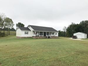 Want a farm house look with a modern twist? Then this one is for you. Sitting on 7.38 gorgeous acres just south of Alpena on Hwy 412. This place has it all. Large bedrooms (all with walk in closets), large bathrooms, full length covered porch and large deck for entertaining. The fully insulted shop/garage is plumbed and wired for living quarters. Located 15 min from Harrison, 1 hour from NW AR area, and 30 min to Branson MO. Don't miss out on this one!