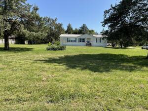 This charming manufactured home is located in a prime area of Green Forest, Arkansas and boasts three cozy bedrooms and two modern bathrooms. The property is situated on a spacious .62-acre lot with a well-maintained, level yard and a convenient shed for storage. The home features brand new stainless steel appliances that add a touch of elegance to the already attractive interior. Additionally, both the front and back of the home have decks that offer scenic views and ample space for outdoor relaxation. Don't miss out on this fantastic opportunity to own a beautiful home in a desirable location!