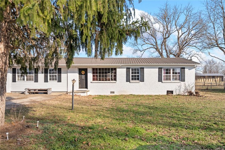 This charming 1,798 square foot home offers a comfortable layout with a semi open-concept floor plan that creates an easy flow between the main living areas while still maintaining defined spaces. The living, dining, and kitchen areas connect seamlessly, making the home feel both spacious and functional for everyday living.  With five bedrooms, there’s flexibility for a growing family, guests, or a home office setup. The primary bedroom provides a private retreat, and the home includes one full bathroom along with a convenient half bath.  Step outside and enjoy the yard — perfect for relaxing evenings, gardening, or weekend gatherings. Recent updates include new LVP flooring in 2025, a new HVAC system in 2023, and a new roof and water heater in 2021. Located in a quiet and friendly neighborhood, this home offers comfort, space, and peace of mind.