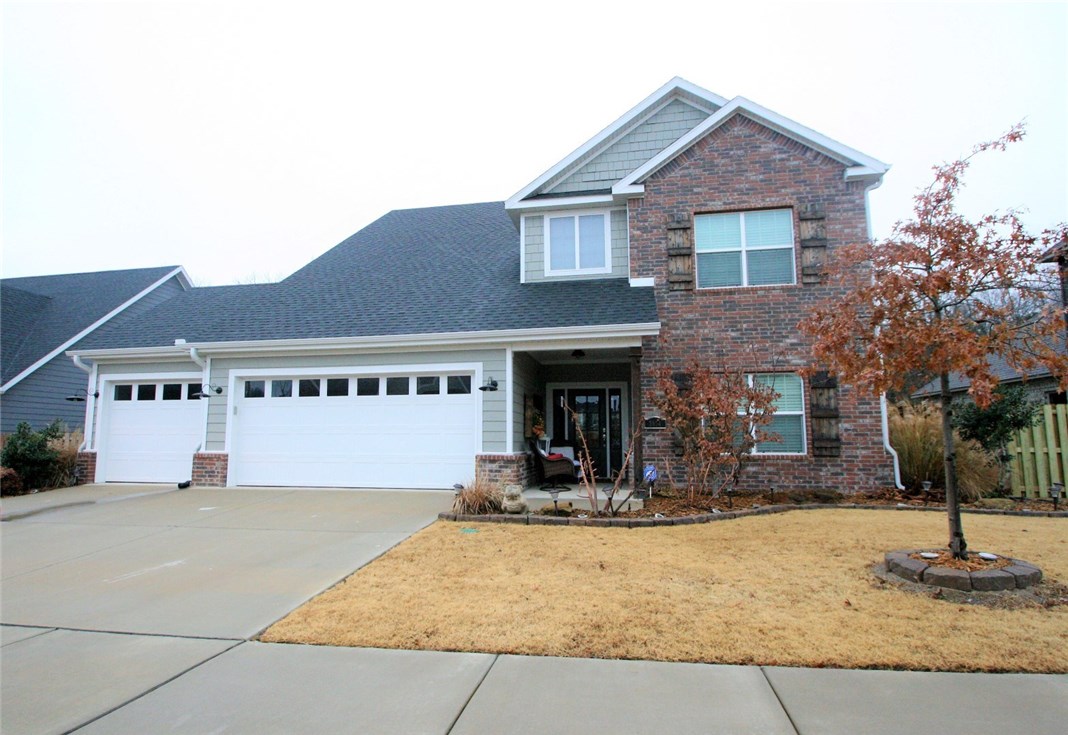 Classy Open Concept! Large living area w/ fireplace & built-ins. Bright kitchen features built-in oven & microwave, gas stove, farmhouse sink, & lg pantry. Lg master w/ double vanity, jetted tub & walk-in shower. Great walk-in closet connects to utility room. Bed, bath, & bonus upstairs. Additional bed & bath downstairs w/ master. 3 car garage, storage galore, walk-in attic space, and more!