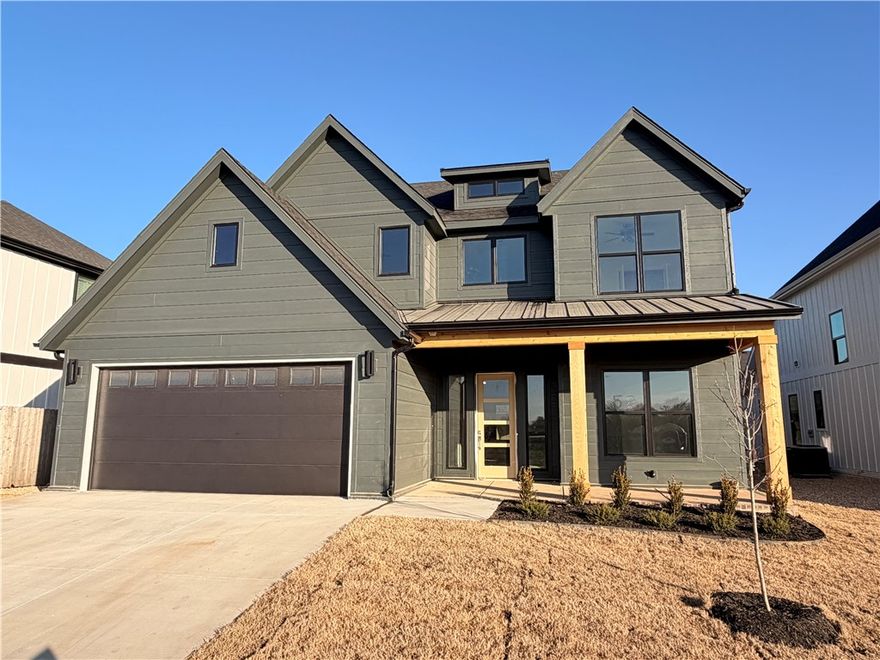 Welcome to Meadow Brook in SW Rogers! Great community in the best location! This plan features 3-4 bedrooms (2 flex spaces either bedroom 2 or study option as well as upstairs bedroom 4 or bonus room). All bedrooms have walk-in closets with plenty of storage! Downstairs you will find the primary bedroom. Great layout with open kitchen/living room area. Kitchen has large island to sit up to 6 bar stools, built-in gas cook top, built-in oven and microwave, large pantry, and eat in dining area. Primary bedroom feature en suite bathroom with soaking tub, walk-in shower, his and hers separate vanities, and large closet with lots of built-ins. Bedrooms 3 & 4/bonus room are upstairs along with a full bathroom. Enjoy the evenings grilling on the covered back patio! Can't beat location being only minutes to shopping, dining, groceries stores, and only steps to the Razorback Greenway Trail.