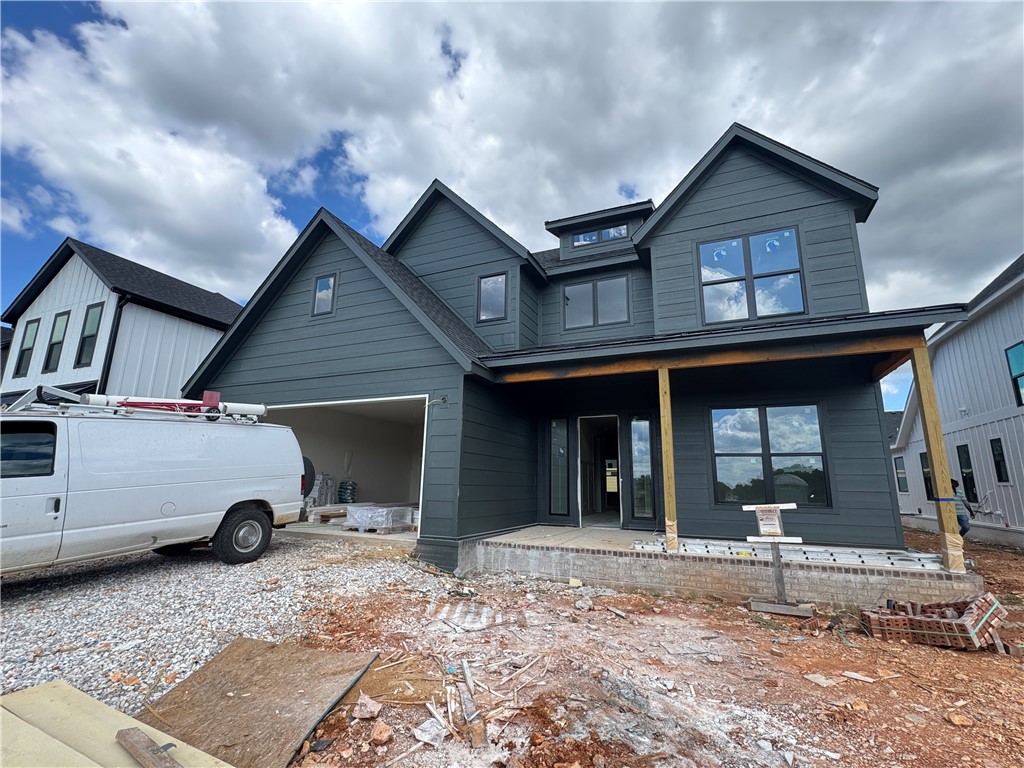 Welcome to Meadow Brook in SW Rogers! Great community in the best location! This plan features 3-4 bedrooms (2 flex spaces either bedroom 2 or study option as well as upstairs bedroom 4 or bonus room). All bedrooms have walk-in closets with plenty of storage! Downstairs you will find the primary bedroom. Great layout with open kitchen/living room area. Kitchen has large island to sit up to 6 bar stools, built-in gas cook top, built-in oven and microwave, large pantry, and eat in dining area. Primary bedroom feature en suite bathroom with soaking tub, walk-in shower, his and hers separate vanities, and large closet with lots of built-ins. Bedrooms 3 & 4/bonus room are upstairs along with a full bathroom. Enjoy the evenings grilling on the covered back patio! Can't beat location being only minutes to shopping, dining, groceries stores, and only steps to the Razorback Greenway Trail.
