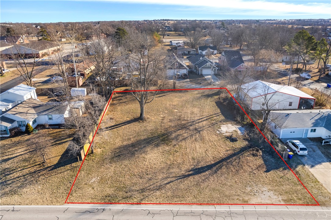Discover the potential of this .38-acre vacant lot nestled in the heart of Lowell, with dual access through the back alley. Ideally located near the historic downtown area, this property offers a blend of charm and convenience. Nearby attractions include the Lowell Historical Museum, a hub of community events and local heritage. Zoned C-3, this lot is perfect for retail, office, or mixed-use residential projects. Positioned in an area of growth with nearby developments like PURE Lowell luxury apartments, this centrally located lot is your chance to create something special in a vibrant and growing community.