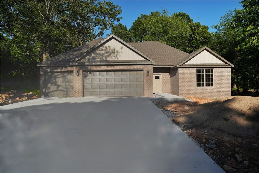 Stunning home with $10,000 buyer credit! Use it to buy down your rate or cover closing costs. Welcome to your new oasis where urban convenience meets country serenity. This captivating single-family home sits on a sprawling 1.01-acre lot, just minutes from the vibrant heart of Bentonville and Centerton.

The home features 4 bedrooms and 2.5 bathrooms, including a spacious master suite and well-appointed baths with high-end finishes. Enjoy an open concept living area with luxury vinyl plank flooring throughout. The expansive 3-car garage offers plenty of room for your vehicles.  

Step outside to a beautiful deck overlooking mature trees and tranquil views. Conveniently located near the airport and local events, this home provides the perfect blend of comfort and accessibility. Don’t miss your chance to experience this extraordinary lifestyle!