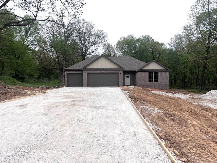 Stunning home with $10,000 buyer credit! Use it to buy down your rate or cover closing costs. Welcome to your new oasis where urban convenience meets country serenity. This captivating single-family home sits on a sprawling 1.01-acre lot, just minutes from the vibrant heart of Bentonville and Centerton.

The home features 4 bedrooms and 2.5 bathrooms, including a spacious master suite and well-appointed baths with high-end finishes. Enjoy an open concept living area with luxury vinyl plank flooring throughout. The expansive 3-car garage offers plenty of room for your vehicles.  

Step outside to a beautiful deck overlooking mature trees and tranquil views. Conveniently located near the airport and local events, this home provides the perfect blend of comfort and accessibility. Don’t miss your chance to experience this extraordinary lifestyle!