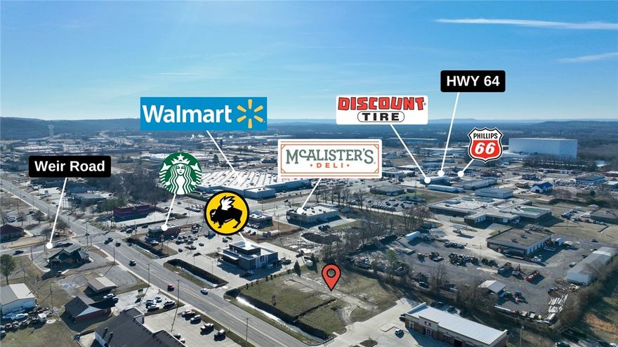 LOCATION! LOCATION! LOCATION! Don't miss this prime opportunity to own a highly visible commercial property in an unbeatable location. Just minutes away from I-40 interstate & surrounded by national retailers & established businesses including WAL-MART, Starbucks, 7-Brew, Buffalo Wild Wings, RNR Tire, & more, offering exceptional exposure for your business.