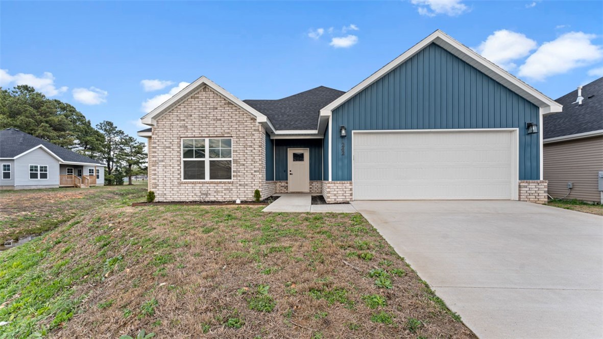 Welcome to Phillip's Park! Beautiful quality New Craftsman style homes in the center of it all in Gentry; close to Gentry Schools, City Park and Gentry Splash Pad. The Gracelyn Plan features 3 bedrooms, 2 bathrooms, walk-in closets in every bedroom, full wood cabinets, pantry, quartz countertops, open floor plan, large island, linear gas fireplace, large laundry room, mud room and covered porch. Complete with vinyl siding, brick and double pane windows for energy efficiency and curb appeal.