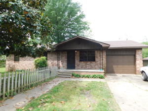 So clean and cute! This 3 BR 1 BA is waiting for you. Single car garage, deck, fenced front yard, as well as hardwood floors and two outbuildings are yours at this location! HVAC less than 5 years old.