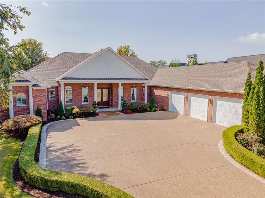 Welcome to your dream home! Nestled on a spacious half-acre estate, this beautiful residence features 4 bedrooms, an office, and 3.5 bathrooms, providing ample space for family and guests. The heart of the home is a huge, gourmet kitchen equipped with an island, double oven, Viking gas cooktop, ice maker, and beverage cooler—perfect for culinary enthusiasts and entertaining. The hearth room adds to the comfort and elegance. Step outside to your private oasis, complete with a built-in swimming pool and an outdoor kitchen, ideal for summer barbecues and relaxing evenings. The expanded 3-car garage offers plenty of room for vehicles and storage. All appliances, TV's, Washer and Dryer, Media Center and outdoor furniture convey! Located in a desirable gated community, this home combines luxury and convenience. This is truly move-in ready! Don’t miss this opportunity to own a piece of paradise!