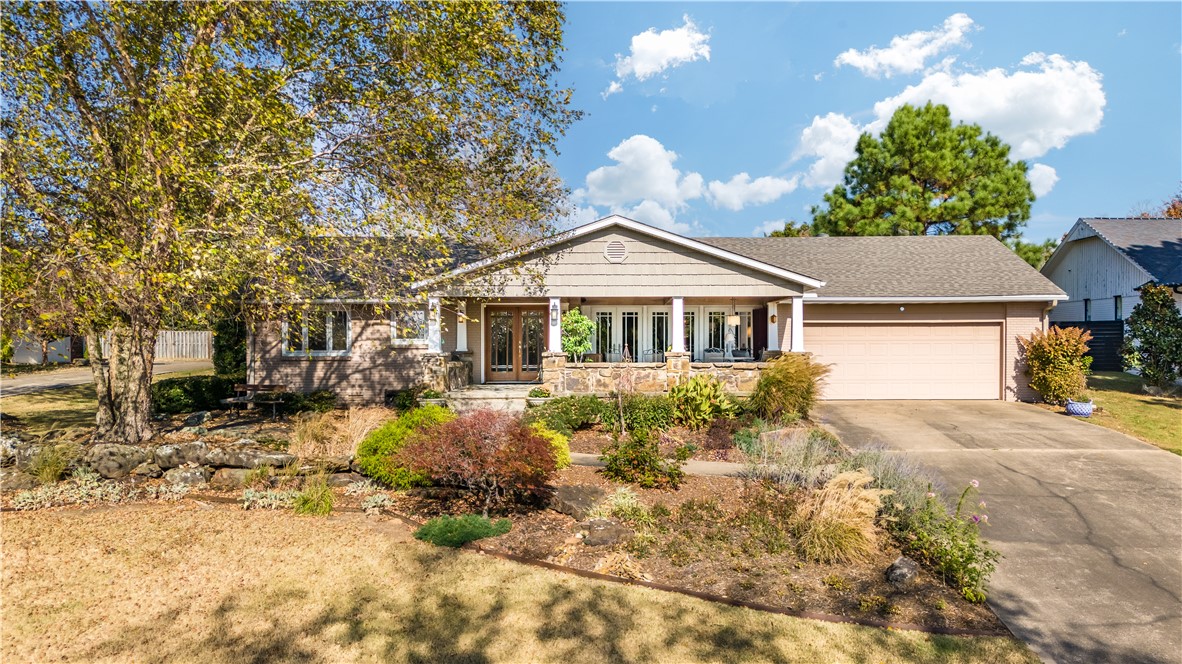 Wonderful, solid three bedroom, three bath home on one level at one of the highest elevation locations in Fayetteville. Centrally located, this home was originally built in 1955 and has been loved on and lived in by its current owners for the last 20 years. Well maintained with a new roof in 2020, a tankless water heater in 2020, and a new furnace/HVAC in 2016, the home is ready for a new family. Featuring two large living spaces and the kitchen as the center hub of the home, Pella windows and real wood flooring, you can entertain in every direction including the stunning 400+ sqft front porch area.