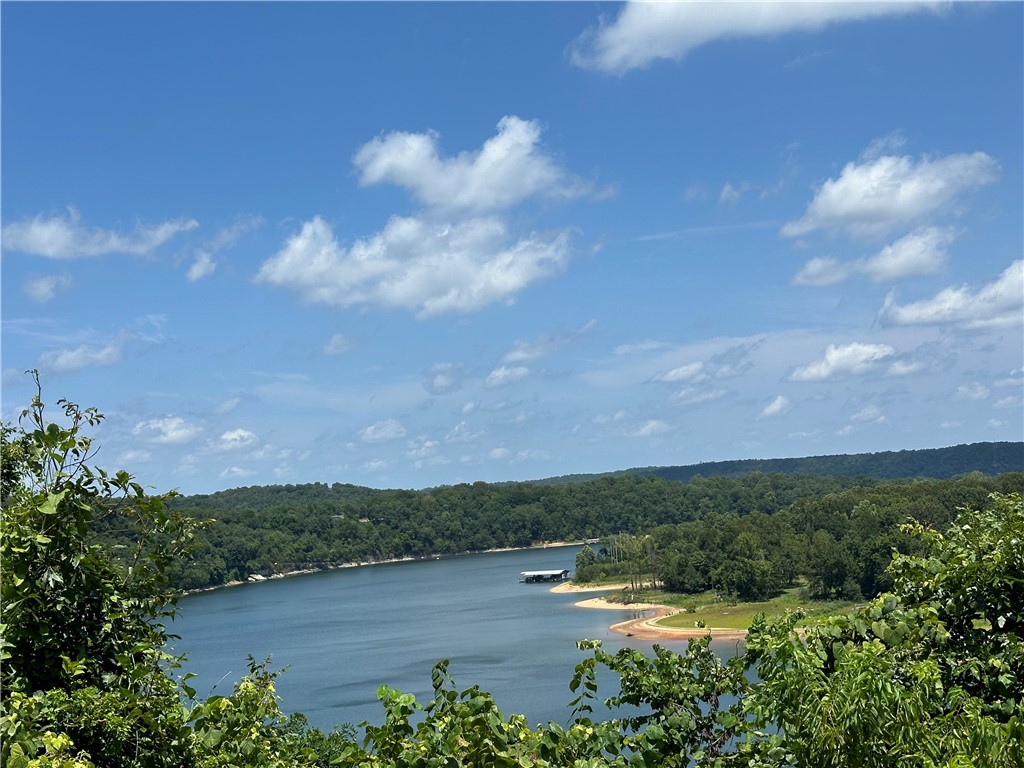Perfect for the Vision-Minded Buyer, this lakefront lot spans nearly 2 acres with stunning views of Beaver Lake near War Eagle Marina! Ideal for a home with picture windows wall floor to ceiling to soak up the expansive view. Build a rooftop patio to extend your view of the lake, it is the perfect place for entertaining! Located in the Springdale school district, this lot is perfect for a multilevel house design. Don't miss out on this unique opportunity!