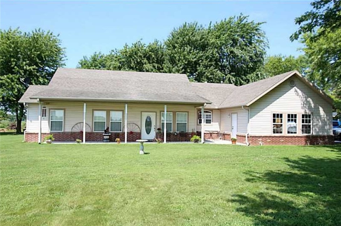 Beautiful mini farm with lots of trees and shade. Country home sitting on 3.0 quiet and peaceful acres. Home has 3 bedrooms with a split floor plan. Hallway, 3rd bedroom, and hallway bath doorways are handicap accessible. New paint and new tile floor, recently added. Ceiling fans in every room. Storage building. Lots of space and country living at its finest! A portion of the property is in pasture located behind the home.