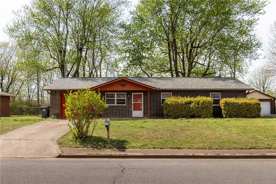 Welcome home to this West Springdale brick property offering comfort, convenience, and value! This 3-bedroom, 1.5-bath home features a welcoming living room, a roomy kitchen with a refrigerator and a dedicated dining area, durable LVP flooring, and neutral paint throughout, making it truly move-in ready. The laundry area with washer and dryer is conveniently located in the 1-car garage, for an efficient use of space. Enjoy outdoor living with a covered front porch and a spacious, fenced backyard with mature trees and a patio- perfect for relaxing or entertaining. In addition, there is extra storage available in the storage building, providing space for your lawn tools, bikes, and more. Peace of mind comes with a brand-new roof installed in February 2026 and a new garage door motor/opener installed January 2026. Ideally situated near Elm Springs Rd, I-49, shopping, restaurants, medical facilities, a fire station, and schools, this home checks all the boxes at an awesome price point. Don’t miss your chance to see it!