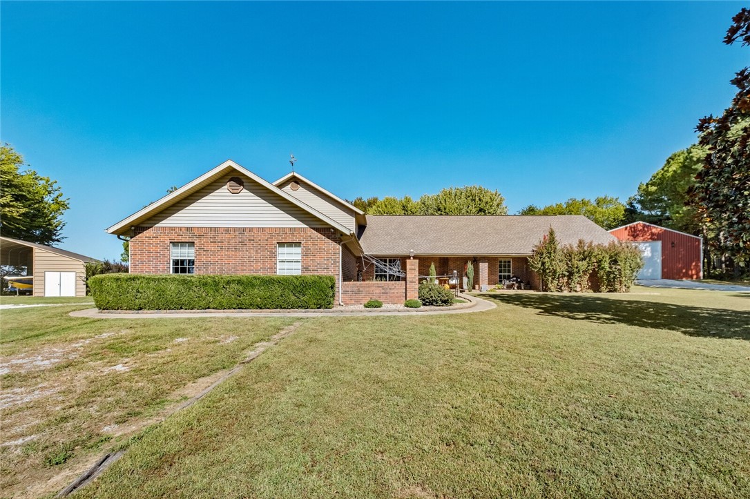 Beautiful Pine Tree haven, welcome to your secluded drive (lined with pines) and perimeter lined with pines to create your private oasis! This lovely property boast a brick 5 BR/2.5 BA home, lots of extra storage, walk-in closet(s), open floor plan with vaulted ceilings, enjoy the fireplace during the winter months, create your own space in the heated/cooled sunroom (currently used as a workout area), the 5th bedroom could be an entertainment loft area or additional living room/media room/office/hobby, opportunities are endless, storage space above the garage (access from inside) to store your holiday items. ANYONE who has hobbies or needs a shop, this property has a NEW 40x60 concrete/plumbed/electric (LED) roll door for RV/Camper/truck, back door exit/create another entertainment area, above ground pool with fire pit to enjoy year-round, also a second smaller shop for storage/lean-to for your boat/sxs or extra vehicles/tools. Sit on your front porch OR your private porch covered off the master bedroom, SOLAR TOO!