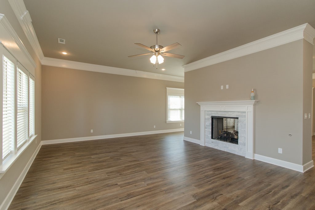 Remarkable new construction 3 bed 2 1/2 bath single story home now available. Complete with SS built-in appliances including convection oven, mw, & gas cooktop surrounded by granite countertops. See-through fireplace in the living room is the perfect architectural focal point. Windows are wood cased & have 2 1/2" blinds installed. Large front porch, fully sodded yard, landscaping & privacy fence give the home tremendous curb appeal. 10 x 20 back porch is covered & home has fully installed gutters. Keyless pad on garage door for ease of access opens the garage door to a full size garage space. Master bedroom has an oversized 5 x 5 tile shower & the master closet wraps around into the laundry room w presoak sink located close to the garage for easy access. Half bath in living room hall area is equipped w pocket door so that it does not hinder the living room space. Exterior brick & cedar construction for a long life & ease of maintenance. Make this your next home. Interior finishes vary, photos of similar floor plan.