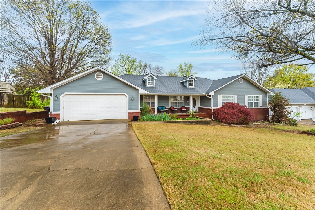 Beautiful home in a desirable neighborhood. This home features two large living areas and a formal dinning area that could be used as an office. The primary bedroom could accomadate large furnishings, nice sized walk in closets and a remodeled bathroom. The additional bedrooms are ample sized and have closets with great space. Zoned heat and air with two units.The backyard is an oasis with a spacious covered patio. There is also a nice storage building in the corner of the yard.