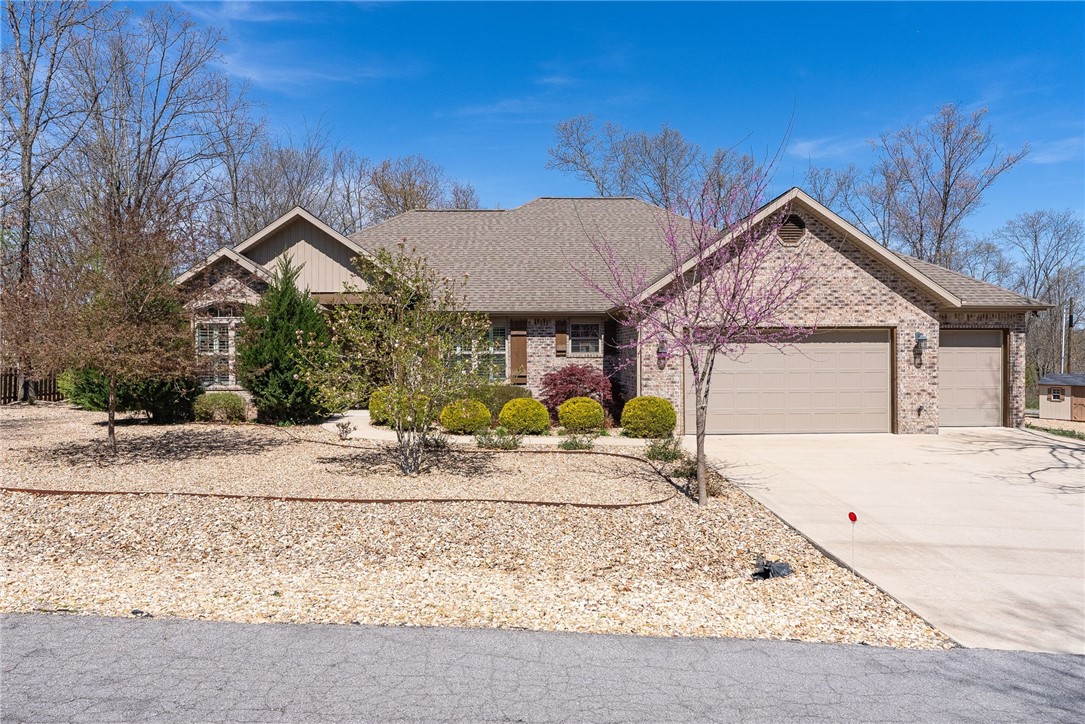 Welcome to your beautiful one-owner home nestled in the northwest corner of Bella Vista, Arkansas! This spacious property offers the convenience of one-level living and sits proudly on a double, low-maintenance, flat lot, providing ample space for outdoor activities or potential expansion. Enjoy the tranquility of the neighborhood and the proximity to Lake Loch Lomond, perfect for outdoor enthusiasts. With its well-maintained interior and picturesque surroundings, this home offers a perfect blend of comfort and convenience. Don't miss your chance to make this 3 bed, 3 car garage, and three-season room property your own slice of paradise in Bella Vista!