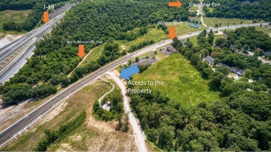 Vacant land, see MLS #1337806. Perfect spot for mixed use development! This is an iconic site location that can be seen for miles off I-49 and would be the 1st thing welcoming patrons into Bentonville off N Walton Blvd. Perfect for hotel, restaurants, townhomes, cabins, bike park/resort and more!