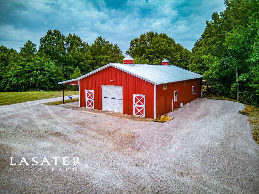 Properties like this don't come around often, here's your chance to own 315 BEAUTIFUL acres right in the heart of the Ozarks! The winding asphalt driveway not only adds to the serene aesthetic, but also provides convenient and easy access to the property. This expansive parcel features an immaculate 60x40 shop with 2 horse stalls, a picturesque creek, a well, a septic, 2 electric meters, a 2 car garage, a storm cellar, a pond that boasts a dock & gazebo, and more!! Not to mention being situated less than 2 miles off US-65 N, you're only 20 minutes from both Harrison, AR and Branson, MO, giving you the rare blend of seclusion and accessibility. Whether you're looking for privacy, breath taking views, or an abundance of wildlife, you'll find it here! Schedule your showing today!