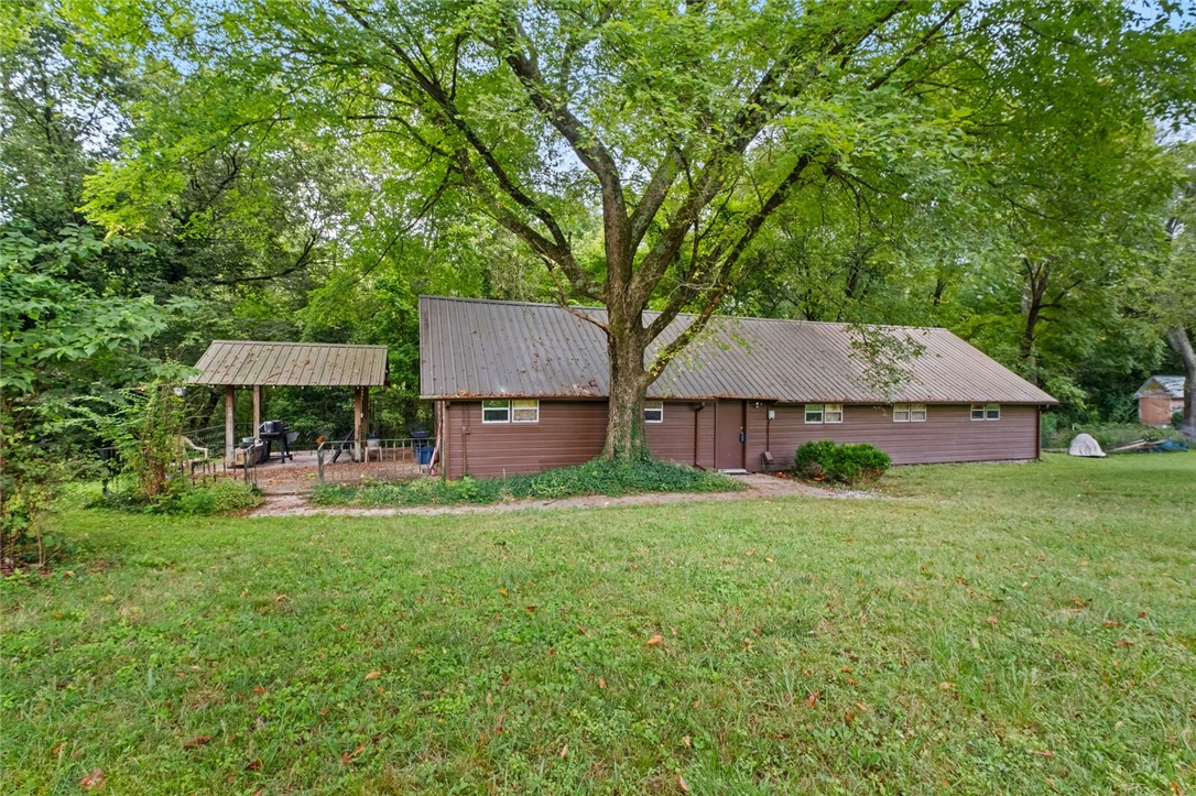 Come create your own place here. This is a true fixer upper with unlimited possibilities. With almost three acres, you can create a great property that is sure to be an oasis or fix up the current home. Home is 2 story but truly could be a great one story property with a nice fix and slip.