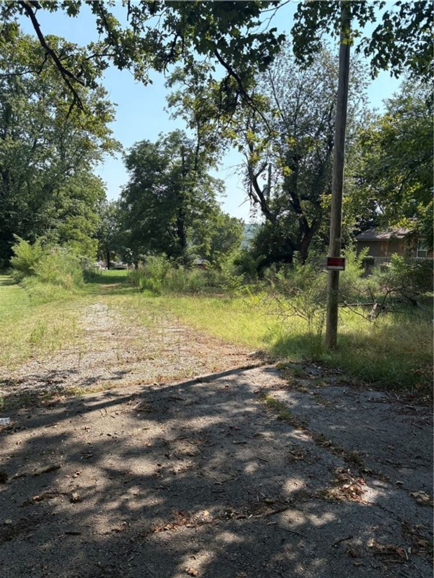 Multi-family Development Opportunity on the edge of the University Campus! This land parcel is less than half a mile from the University of Arkansas campus, shopping/dining entertainment district and only minutes from Dickson Street/Fayetteville Square! Zoned RMF-24, this land has the capability for at least 5 units (subject to city approval) for student housing. Or just build your dream home by the Razorback football stadium!