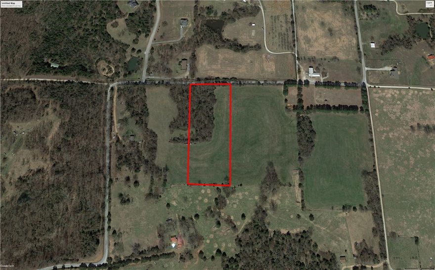 Located in east Fayetteville is this beautiful partially open and wooded 5.33 acre lot - perfect for your new construction home! Blacktop frontage, on public water, Ozark Go available in the area, and in Fayetteville School District. Near Lake Sequoyah Park, 20 mins from Downtown Fayetteville and 10 mins. from Elkins & Goshen. Subject to lot split approval. Agent owned.