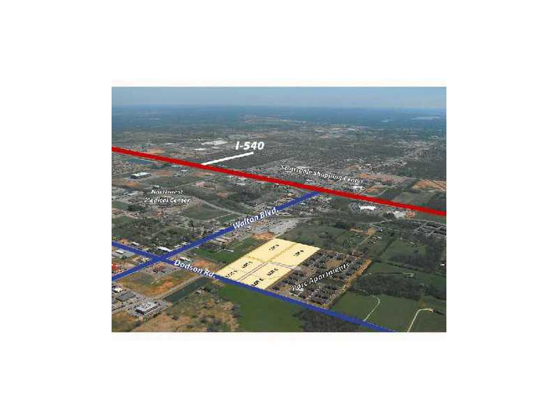 This consists of all 6 parcels; Beautiful bronze animals grace the entry way of this commercial land development. Ideal for office campus or senior housing living; Dodson Road is scheduled to be expanded, parcel has street, curb, gutter, zoning in place; utilities; level & ready to build-ideal to be close to everything, but not in the Traffic of everything; just south of Walmart "Pick up" Located between Mercy & NW Medical! Primrose Assisted Living is across the street, more apt. development across street