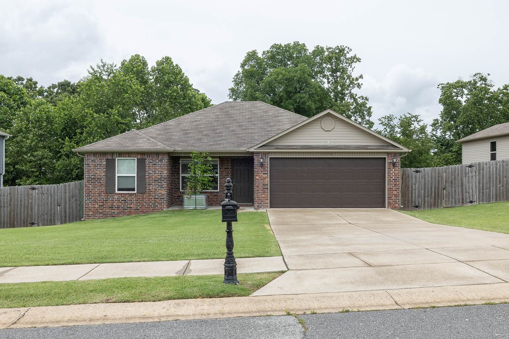 This property should have an Avoca address. It is closer to Rogers than Garfield. Not far off of Hwy 62 and just past Rogers airport. A charming 3-bedroom, 2-bath home in the Deer Haven subdivision, nestled on a flat 0.33-acre lot in a peaceful cul-de-sac. Built in 2020, this 1328 sq ft single-level residence offers a thoughtfully designed split floor plan with energy-efficient features, including Energy Star appliances, LED lighting, programmable thermostat, and electric central heating and cooling. The open eat-in kitchen includes a pantry, electric glass cooktop range, microwave, dishwasher, and a Whirlpool side by side refrigerator with front ice/water dispensing. LG Washer and dryer are also included. Enjoy outdoor living on the covered patio just off the kitchen. Concrete driveway access and a spacious attached 2-car garage. Located just minutes from Rogers schools, this home combines suburban comfort with modern convenience. No HOA fees. Schedule your showing today!