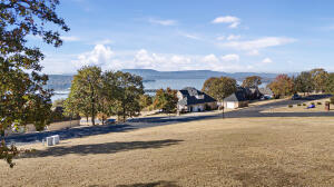 Build Your Dream Home with Stunning Lake Views!Nestled on a scenic hillside with breathtaking views of Lake Dardanelle, Lots 81 and 82 offer the perfect opportunity to create your dream home in the prestigious Pleasant View Estates. Whether you're envisioning a cozy retreat or a spacious forever home, these lots provide the flexibility to suit your vision.Available individually or together for a larger footprint, these properties combine natural beauty with convenience, located close to shopping, dining, schools, and recreation. The elevated terrain enhances the lake views and allows for unique home designs, such as multi-level layouts or expansive outdoor spaces.Ideal for families, retirees, or anyone seeking a peaceful yet connected lifestyle, these lots are a rare find.