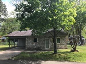 This cute and cozy 2/1 home has all of the updates you are looking for. Beautiful tile floors, double pane vinyl windows, fresh paint, great floor plan, fenced in back yard and a almost new storage building, carport with additional storage.