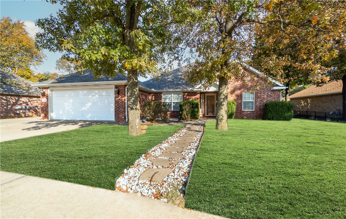 A convenient location nestled in the heart of Rogers and is also less than a mile from I49 and Bentonville! This 3-bedroom, 2-bathroom home with a nice committed office space boasts a fantastic location and exquisite interior. Well maintained and tastefully updated, this property showcases beautiful hardwood floors, crown molding, and an open concept that provides warmth and charm. The property has seen significant upgrades, including a new roof, fresh paint, and new granite countertops in 2023, along with new carpeting in the bedrooms. The spacious, fenced backyard provides plenty of space for outdoor activities and gardening, and you'll love the screened porch, perfect for savoring the outdoors in comfort. With many upgrades throughout and a great maintenance history, this home offers the perfect blend of style and practicality. Come check it out today!