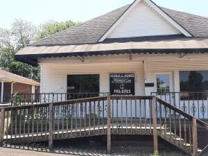 Nice office space, Has central heat and air, asphalt parking lot, concrete front porch & handicap ramp. Was a law firm office but there are several offices ready to operate.