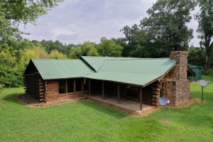 Country living on 40+ acres with hayfield and back of property adjoining National Forest.