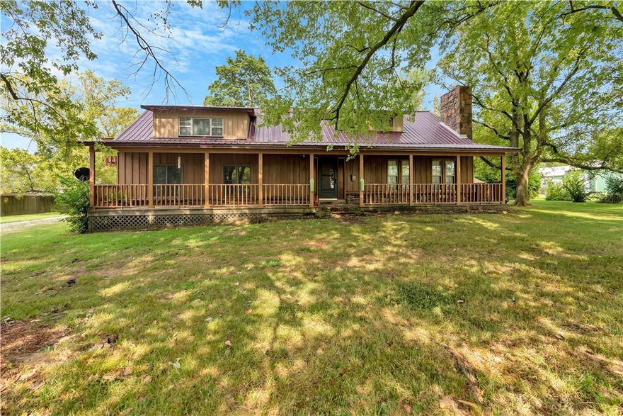 A turn of the century home that was remodeled in 2002. Lots of room and lots of options to make it your own. Hard to find 1 acre lot in town. Large covered front porch with huge shade trees in front. Big screened in porch on back of house. This can be a special place with a little imagination. SOLD AS IS. Close to schools and public park with walking trail. Two storage or shop buildings. Additional 375 sq ft partially finished heated & cooled room. Not included in heated sq footage.