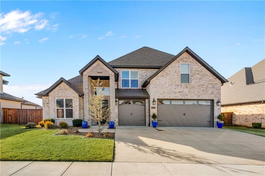 Experience the epitome of comfort and style in this stunning 4-bedroom, 4-bath home, spread across a generous 3,422 sq ft of living space. Designed with sophistication and warmth in mind, this property presents an inviting atmosphere for all.  As you enter, the versatile front room with French doors and wood floors sets a tone of refined elegance. The heart of the home features a gourmet kitchen equipped w/granite countertops, stainless steel appliances, pantry & a unique prep island – perfect for culinary adventures & gatherings. The primary suite boasts a tray ceiling, a spa-like bathroom w/soaker tub & walk-in shower equipped w/rain head & a spacious walk-in closet.  Entertainment is redefined here w/an extended back patio that includes an expansive outdoor bar & kitchen alongside a custom-built fire-pit w/seating. Additional highlights include a bonus room with wet bar & mini-fridge, separate laundry room, irrigation system, central vacuum, ample storage, 3 car garage & fenced backyard for ultimate convenience.