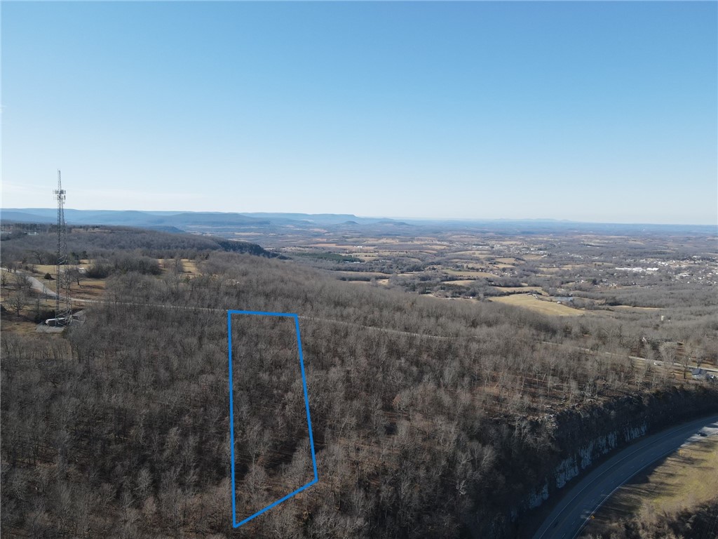 This enchanting property, spanning 3.48 acres, is nestled just outside the charming town of Marshall, Arkansas, making it an ideal blend of rural serenity and urban convenience. Situated within a mere mile of the city limits, this land offers the best of both worlds. What sets it apart are the breathtaking views it commands from South Mountain, overlooking the picturesque Cove Creek Valley. Imagine waking up to the stunning vistas every morning! Moreover, for those seeking flexibility in ownership, owner financing is a viable option, making this property an even more attractive opportunity. Whether you dream of building your dream home or investing in a piece of Arkansas' natural beauty, this property offers the perfect canvas for your aspirations.