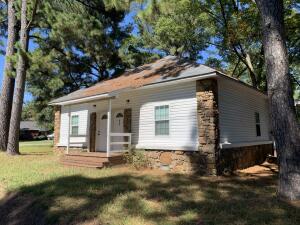 The right place, the right time! This adorable duplex in Atkins is your perfect opportunity to make your money work for you! Each unit has 2 bedrooms and offers wood laminate flooring, a comfortable floor plan, and washer dryer connections. The exterior is classic with lovely rock accents and it sits on a charming tree shaded lot. This is the perfect place to call home or invest!