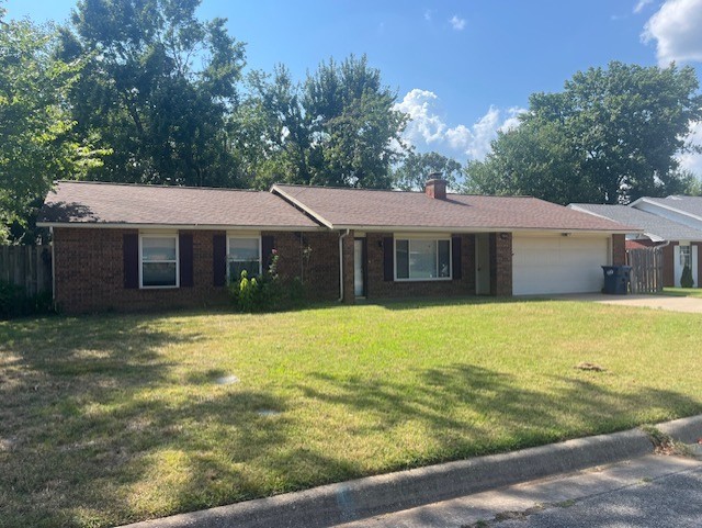 Brick 4 bedroom right in the heart of Rogers in Whispering Timbers! Great location close to shopping, schools and park. Fresh paint, and new appliances. Large backyard with mature trees. It is ready to go! Actual square footage is larger than recorded due to the 4th bedroom addition. A great place to call home!