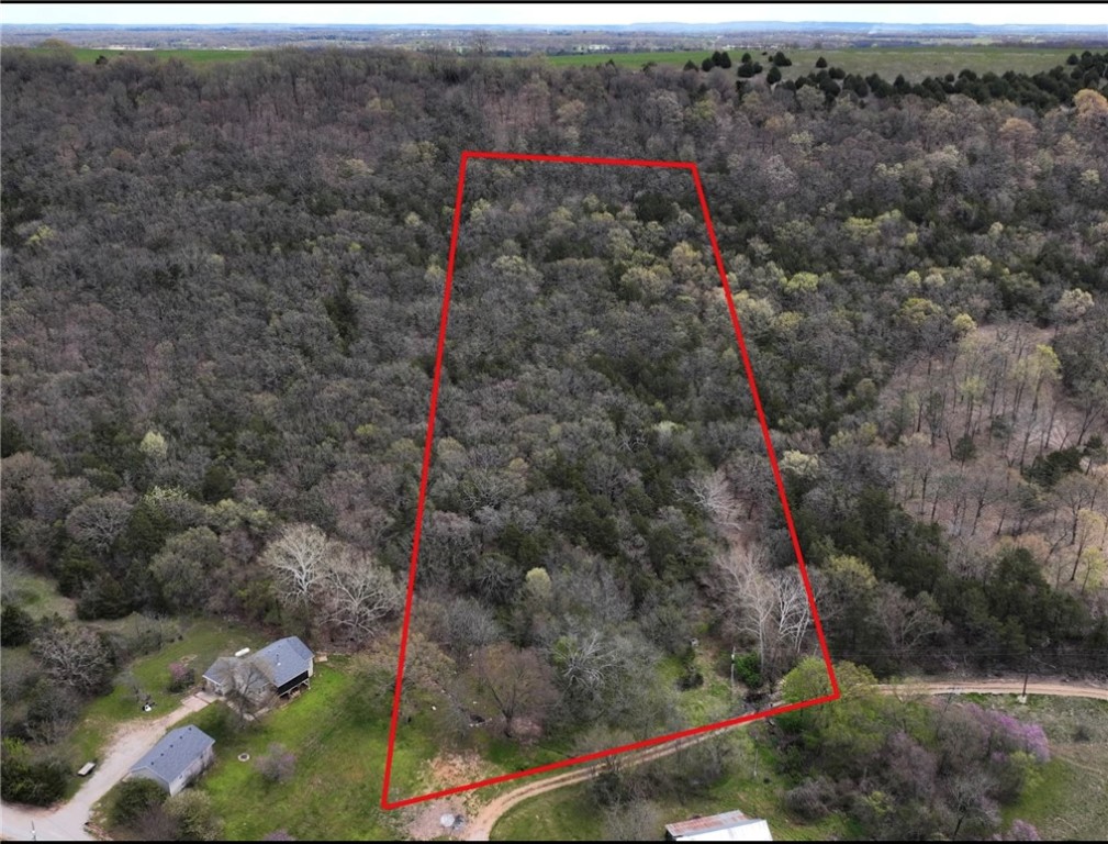 3.12 acre lot in the Beautiful Arkansas Ozarks! Great Building opportunity outside of Berryville in Maple Mountain Estates. Within half our drive to Ridgedale/Branson/Berryville.